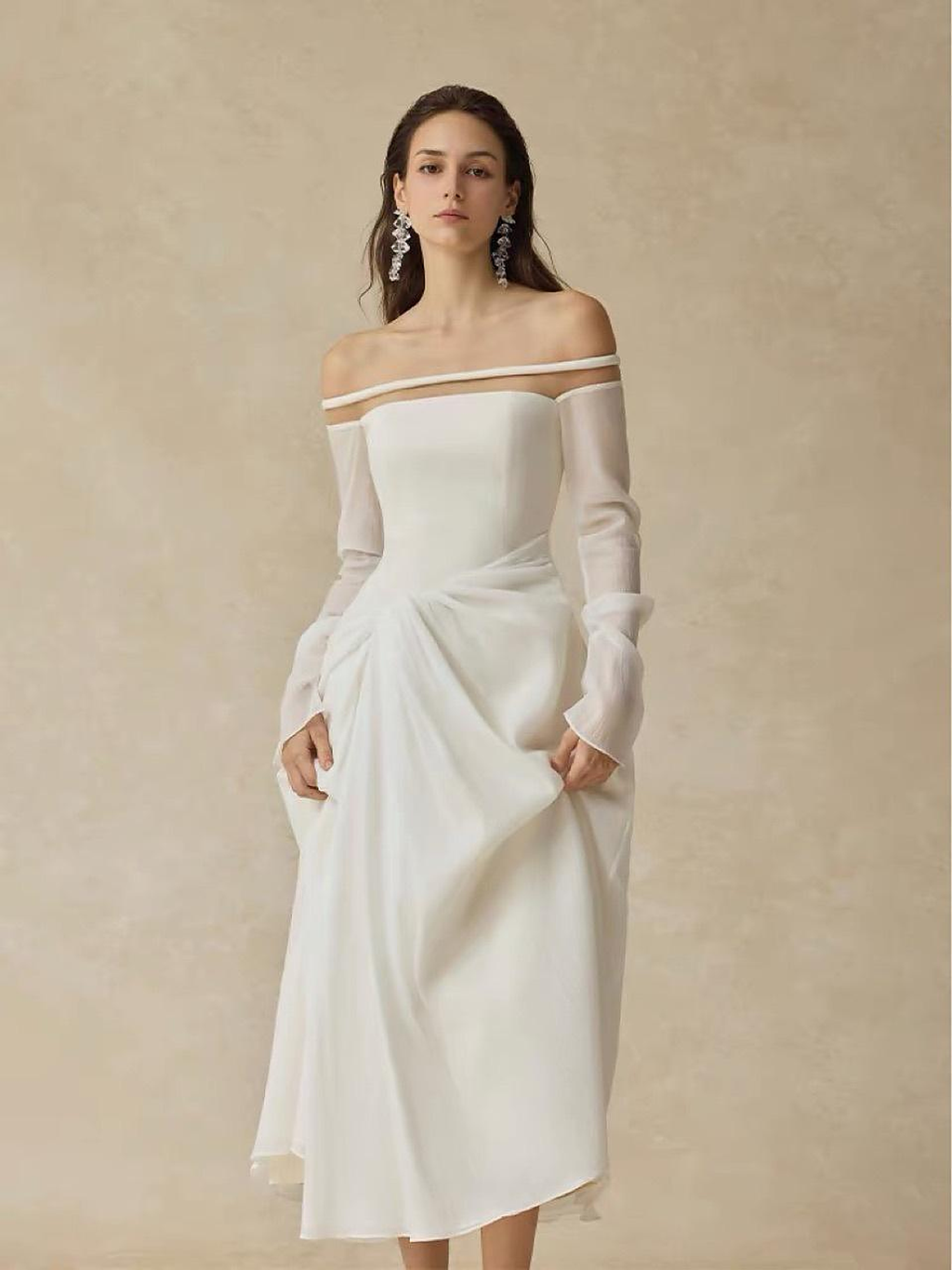 Elowen Off-Shoulder A-Line Gown — editorial pose